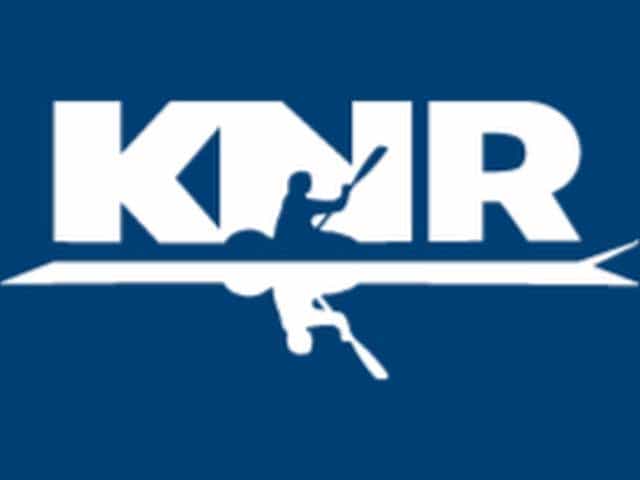 The logo of KNR TV